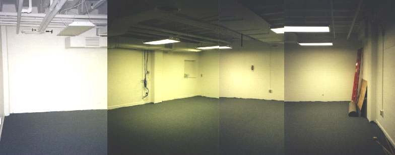 photograph of an empty room with carpet on the floor